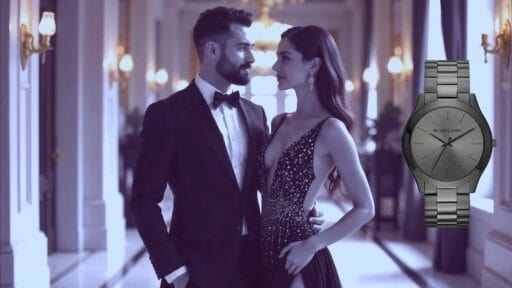 A luxurious photo of a stylish couple in an opulent hallway with ornate decor. The man is wearing a sharp black evening suit with a tailored fit, a crisp white shirt, and a classic bow tie. He has a confident stance, his hand casually in his pocket. The woman is dressed in a glamorous, floor-length gown with intricate beadwork, featuring a plunging neckline and an elegant slit, exuding sophistication. Her makeup is flawless, and her hair is styled in loose waves. The hallway is grand, with high ceilings, golden chandeliers, marble flooring, and gilded mirrors reflecting the soft, warm lighting. The couple radiates confidence and poise, epitomizing high-end fashion and elegance. The couple are looking at each other